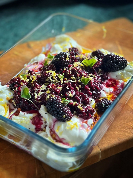 Smoked Burrata with Charred Blackberries, Wood Sorrel & Lemon Oil